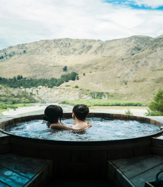 a couple taking part in a cold plunge